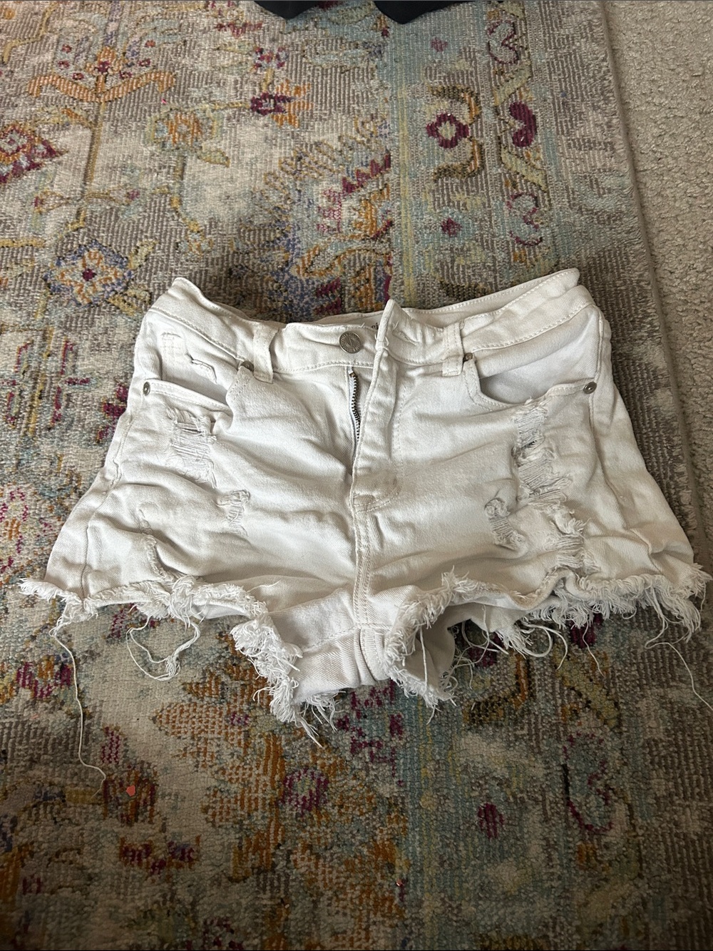 High-Rise White Distressed Denim Shorts
